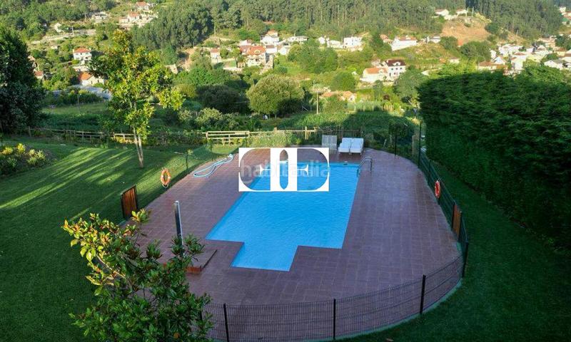 Foto 4735fd3e-7dd9-4474-b521-0fe838f1cfdb. Xalet amb calefacció piscina a Moaña