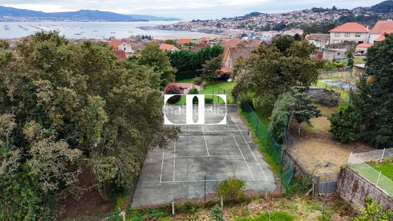 Foto 822cda98-8962-4515-935c-1fd45586675f. Xalet amb calefacció piscina a Moaña