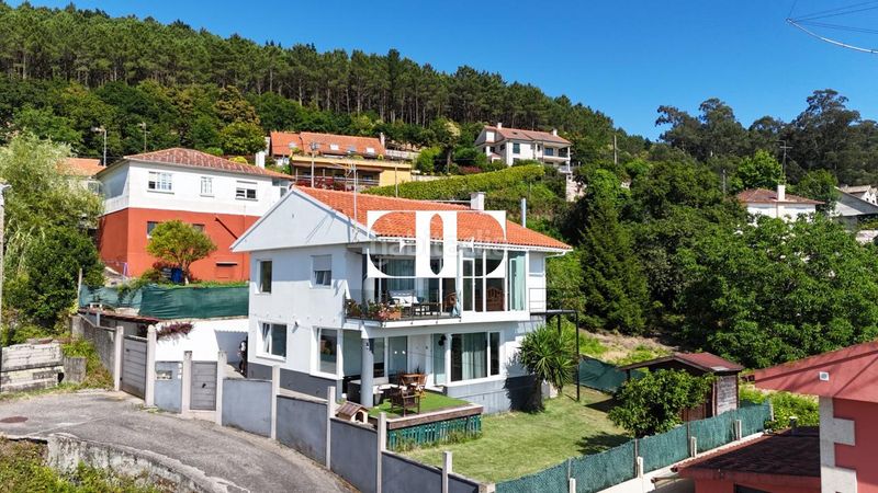 Foto 5dc73d8d-1e4d-4c77-8b3e-89d2cf3dd41c. Casa amb calefacció a Coruxo - Oia - Saiáns Vigo