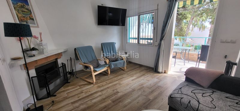 Foto 6862a260-b010-40a9-a8fb-b58e695cba71. Casa adossada amb xemeneia a Benajarafe