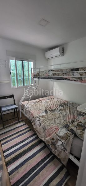 Foto ac6fa430-89a6-422f-8258-b2e838ec7a25. Casa adossada amb xemeneia a Benajarafe