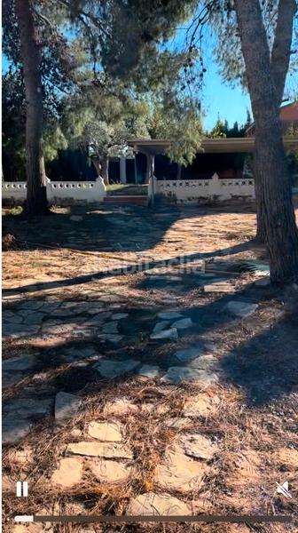 Foto b5443977-d65c-42b3-a208-7dc314de077e. Xalet amb xemeneia aparcament a Vilamarxant