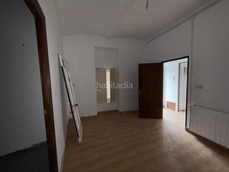 Foto d20610f0-b180-409a-8099-a140fcb135ee. Casa adosada en Campo de Criptana