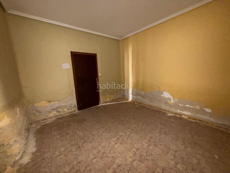 Foto a12b1a6f-2eca-456e-bad4-8fe8bf01a605. Casa adossada a Tomelloso