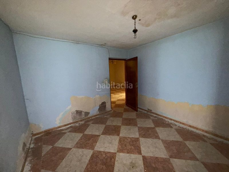 Foto 68ad2745-53d3-441a-a7ae-cfb03cbfb40b. Casa adossada amb aparcament a Argamasilla de Alba