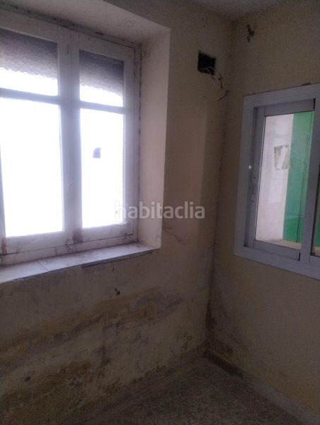 Foto f4a1156a-6c91-4404-92f8-e7eb39bbc8c3. Planta baixa a calle san roque a Daimiel