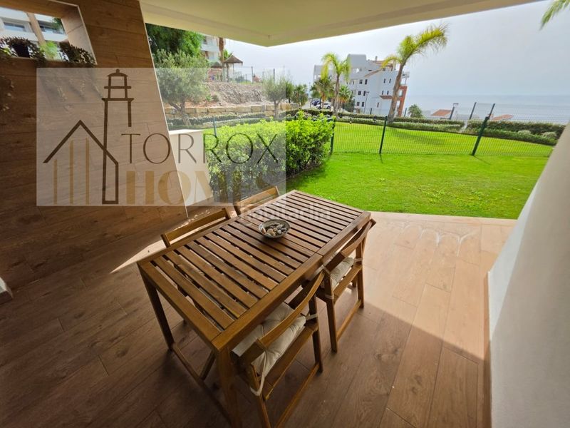 Foto 08d5f3a1-975d-4f3b-81f9-f7197e368a46. Apartament amb aparcament a El Peñoncillo Torrox