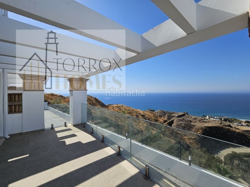 Foto dea5c9a1-9bd0-4d86-b403-98062881d494. Casa adossada amb aparcament a El Peñoncillo Torrox