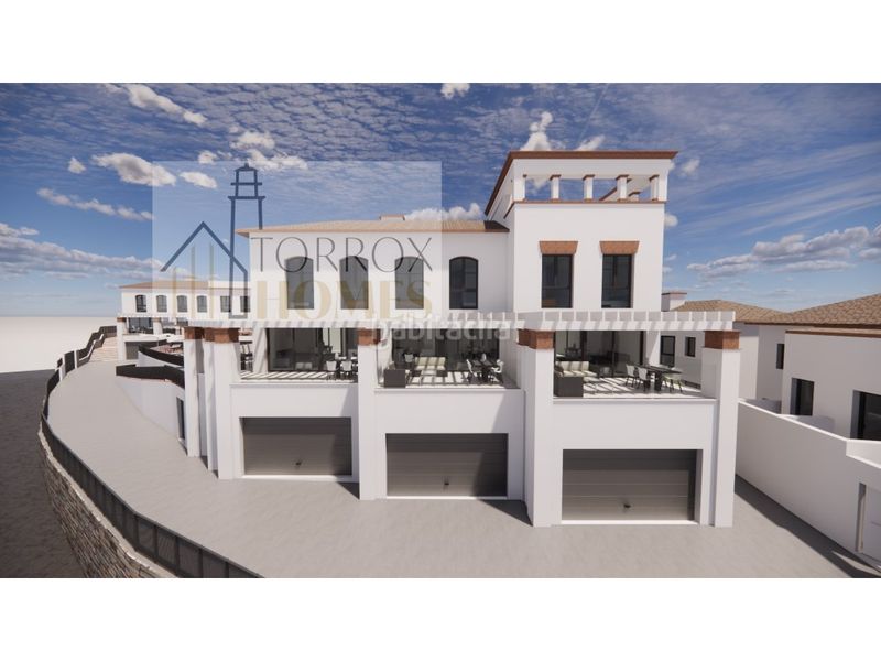 Foto fd1a2056-6a3c-4caa-be0e-d572df515519. Casa adossada amb aparcament a El Peñoncillo Torrox