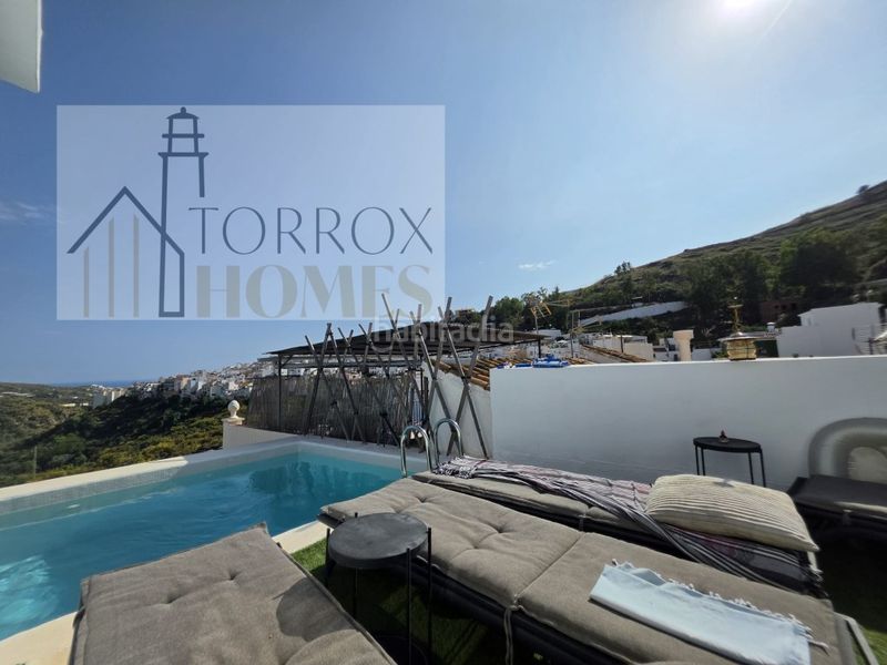 Foto 63e2e36d-4a5b-472f-b58a-3d92178eb485. Casa amb aparcament a Torrox pueblo Torrox