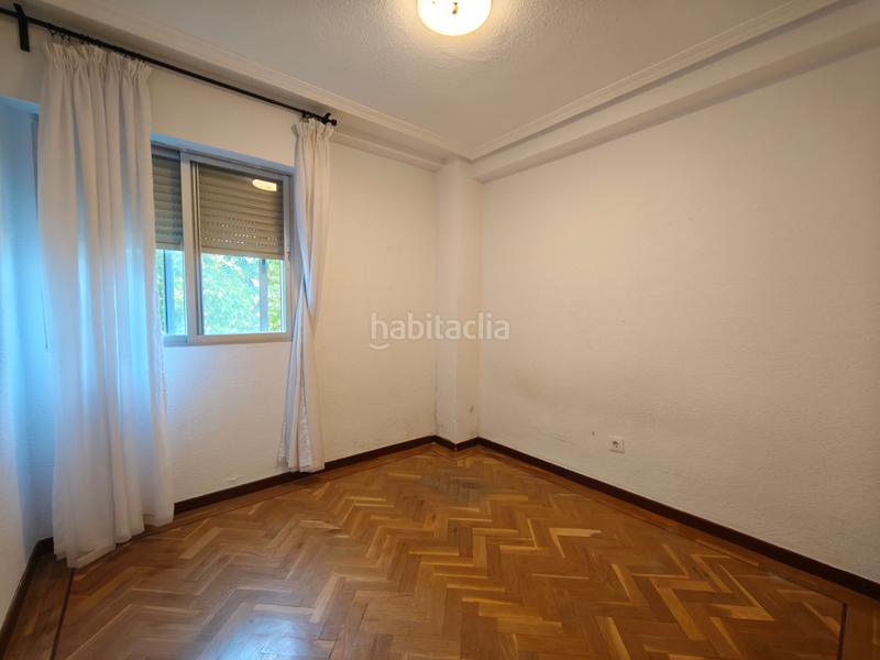 Foto 52e7909b-8e7e-4327-bf52-595d8bef1222. Etagenwohnung mit heizung parking in Aluche Madrid