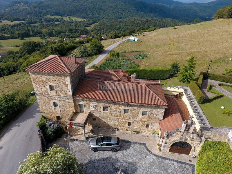 Foto a020ec0d-fb78-445d-8b97-685dd584563f. Bauernhof mit heizung parking in Voto