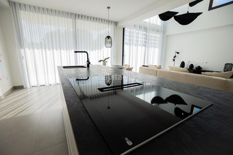 Foto 766e5aa6-e213-4fc4-9b7c-32ad283d482f. Casa con riscaldamento parcheggio piscina in Golf Bahía Finestrat