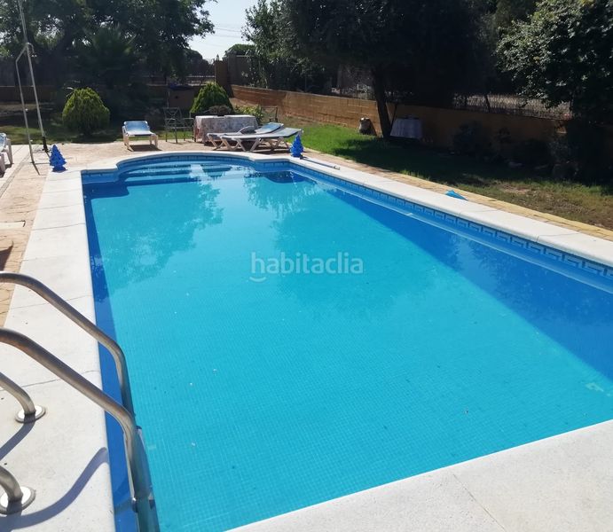 Foto 8c9a4cd5-c892-4439-8854-3cafd2d73580. Chalet con camino riscaldamento parcheggio piscina in Chiclana de la Frontera