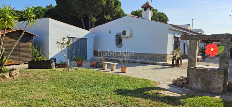 Foto 7a5687b8-f1b8-4ed2-847c-e5ad5da7f7c5. Chalet avec cheminée chauffage parking dans Los Gallos Chiclana de la Frontera