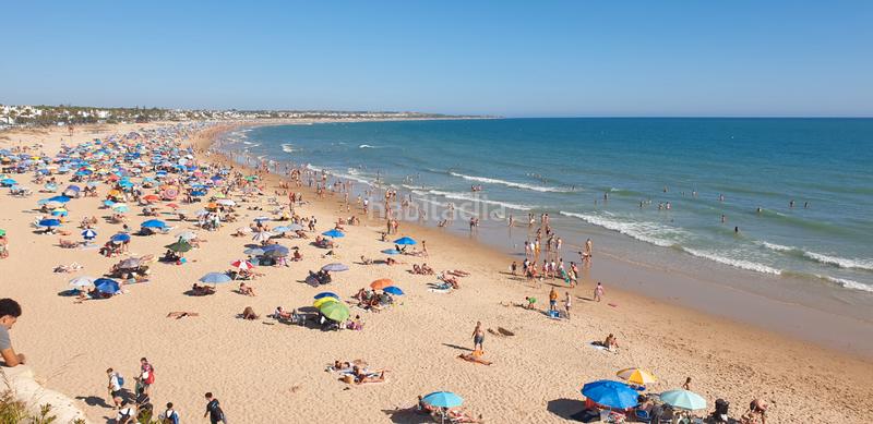 Foto 7ff19403-f269-4224-8821-353b8d93429e. Chalet avec chauffage parking piscine dans La Barrosa Chiclana de la Frontera
