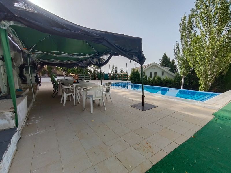 Foto 6d0e1146-e3a9-450a-bccd-aca3df0b4915. Chalet in calle prados del abuelo 28 in Cumbres Verdes Zubia (La)