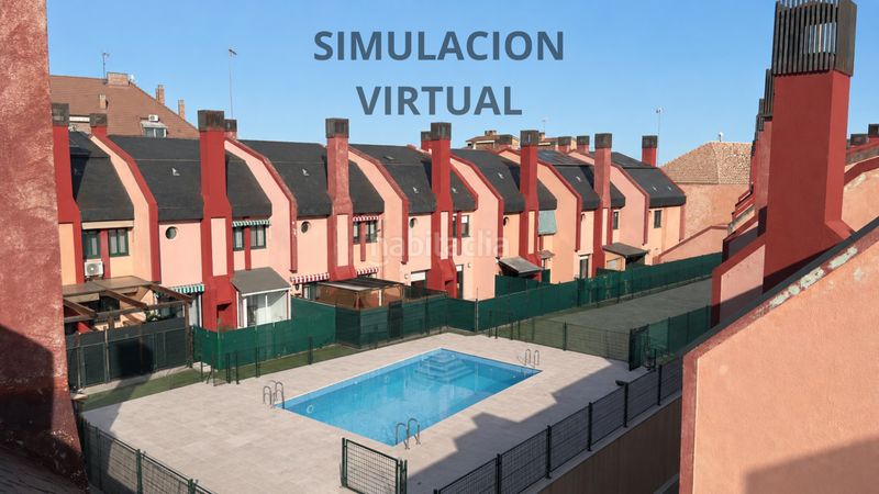 Foto 4d421382-b3af-4a21-a1d1-c697daac3019. Casa adossada amb xemeneia calefacció aparcament piscina a Villanueva del Pardillo