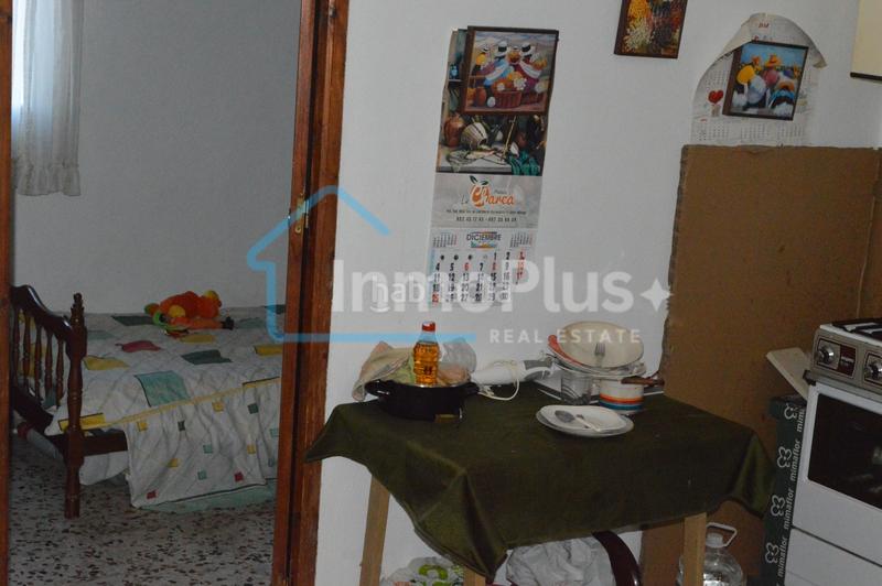 Foto fe431f66-b1c1-4152-b8a2-7e40b7c6f0ca. Masia amb xemeneia calefacció a Guaro