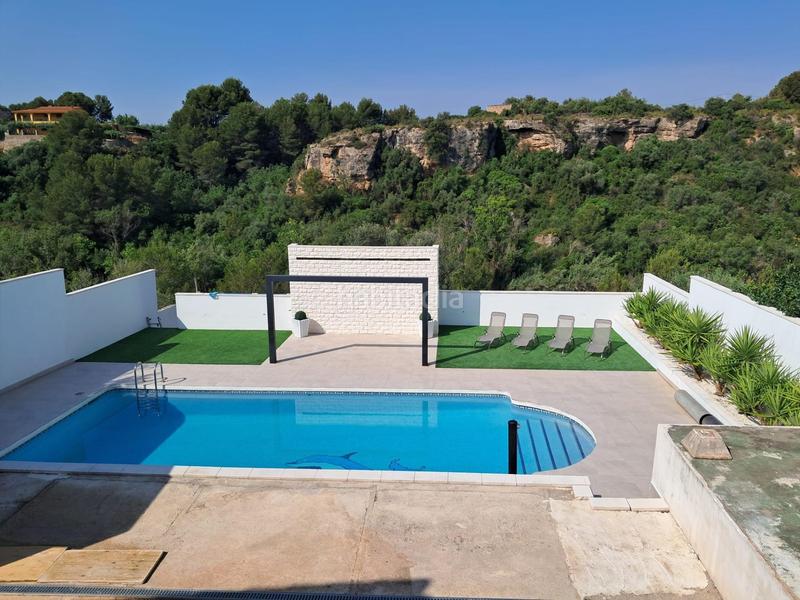 Foto c0a37469-4a2e-46b1-bb16-6c277e768092. Chalet mit parking in Onda