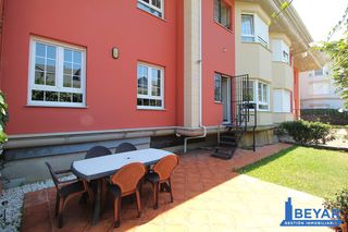 Appartamento in Liencres - barrio las reigadas 22. Bajo con jardín en liencres