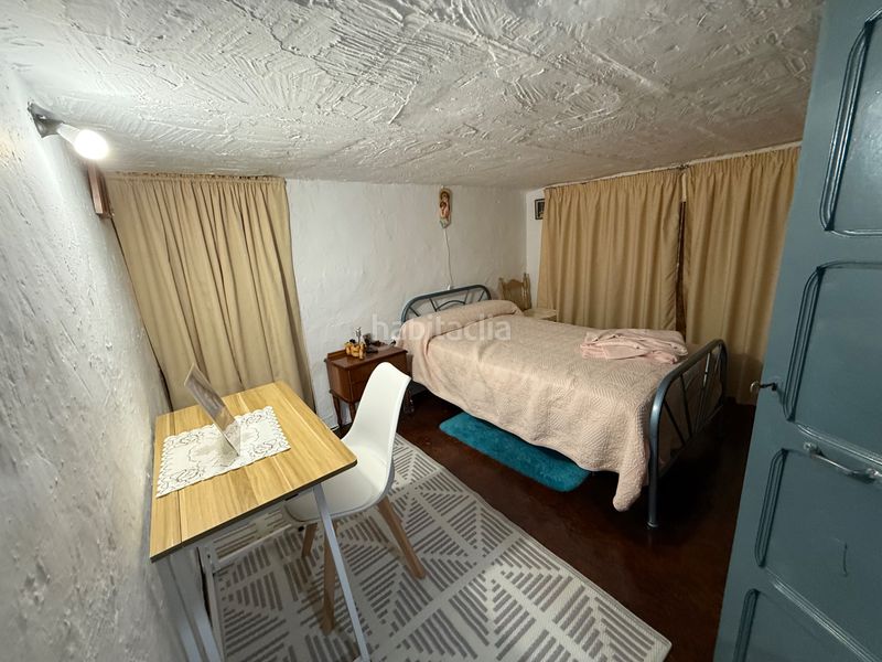 Foto cfaeac04-ffff-45c1-8006-c300a5d0e2f5. Casa adossada a Castillo de Locubín