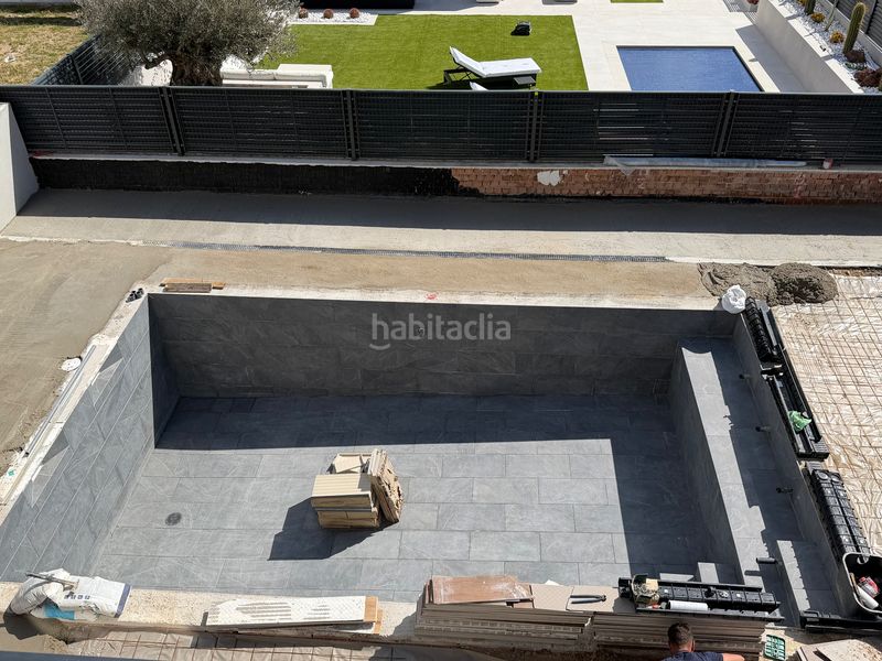 Foto 578232f5-139f-4f61-942f-0145ece5511b. Casa a schiera con parcheggio piscina in El Bosque Villaviciosa de Odón