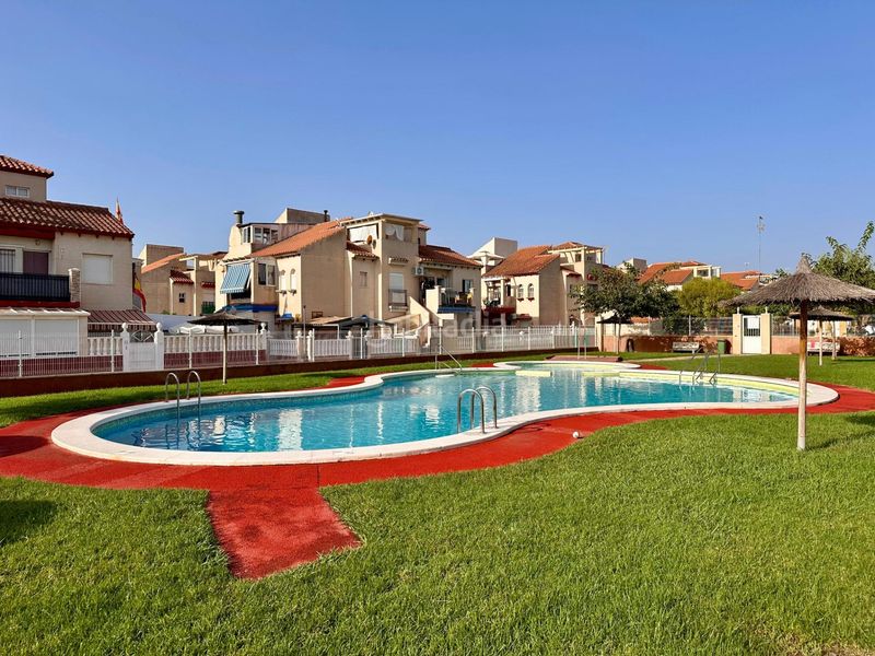 Foto c7f71870-ee2f-4d9f-87fb-e85a1444f9d5. Casa amb aparcament piscina a Playa Flamenca Orihuela