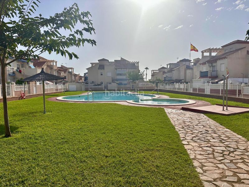 Foto dd0334b7-88f0-466d-8851-89425872b66b. Casa amb aparcament piscina a Playa Flamenca Orihuela
