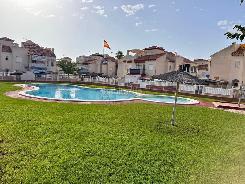 Foto f5650cb6-7917-4f57-a41b-43dfc7a60c1a. Casa amb aparcament piscina a Playa Flamenca Orihuela