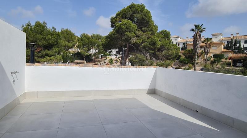 Foto beb3bb2d-a4e0-4f68-8fea-fc06788c7631. Casa adosada chalet pareado con dos terrazas, en Villamartín-Las Filipinas Orihuela