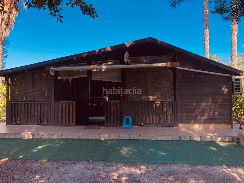 Foto e6957c1a-92c1-4dad-a4bc-405969a98764. Chalet en camino los pinos finca con 2 casas y cabaña de madera huerto de limoneros en produccion naturaleza y rentabilidad en Orihuela