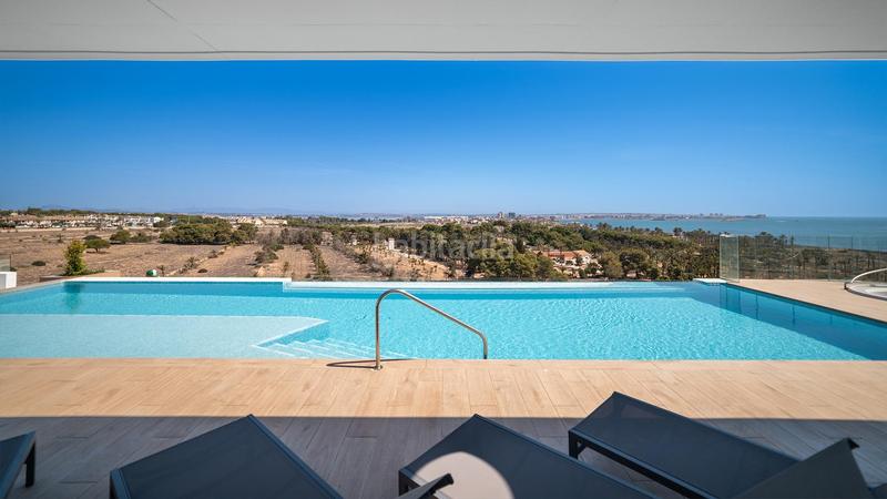 Foto 720a0f0d-b759-4d90-beae-77947ea91130. Appartement mit parking pool in Punta Prima Torrevieja