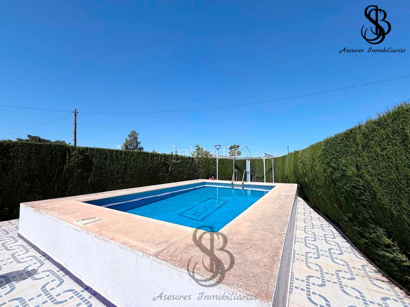 Foto dd684048-3428-47e1-8c1f-e4422aa153e0. Xalet amb xemeneia calefacció aparcament piscina a Busot