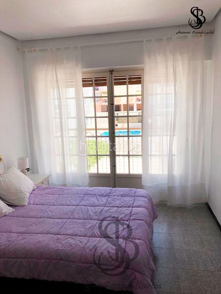 Foto 03cf7299-04ff-49f7-b7f1-2f78382c349e. Casa aparellada amb xemeneia a Calas Santiago Bernabeu Santa Pola