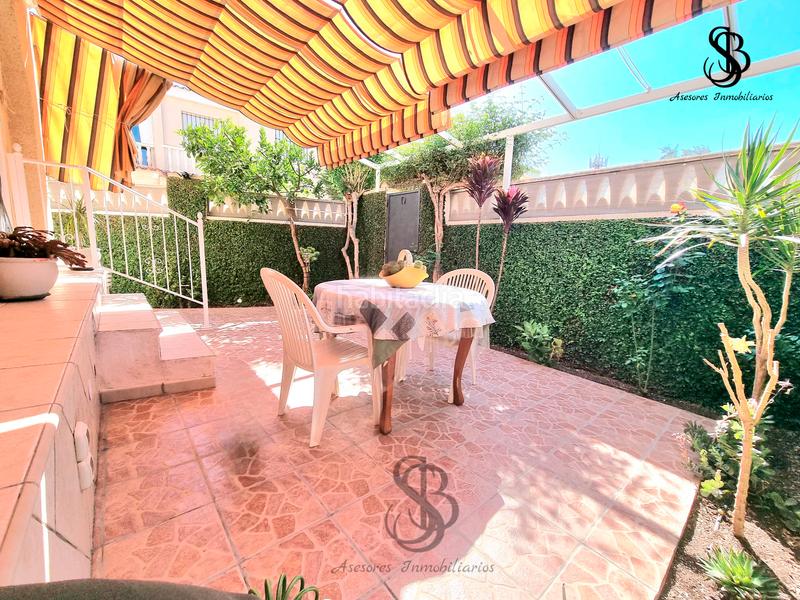 Foto b760f0c5-11ec-45ce-9d64-786910813896. Casa adossada amb xemeneia calefacció aparcament piscina a San Juan de Alicante