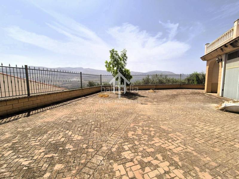 Foto 49c043b9-af8f-46a5-aadc-1ee7cba20b43. Maison avec parking dans Loja