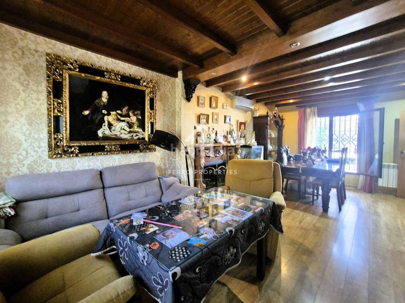 Foto 0469612d-76d7-48a0-8821-8c3db7a68830. Casa aparellada amb calefacció aparcament a Loja
