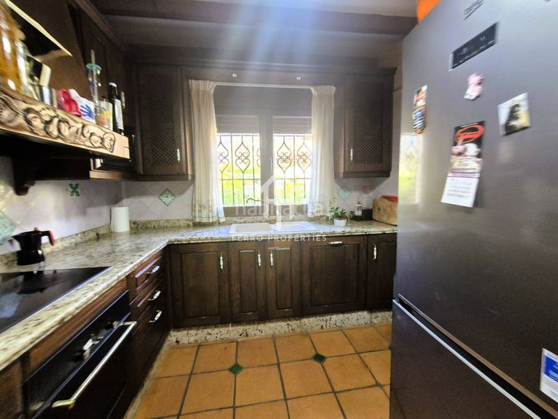 Foto 3380e376-2d8d-44c8-8a1e-4047eeec6028. Casa aparellada amb calefacció aparcament a Loja