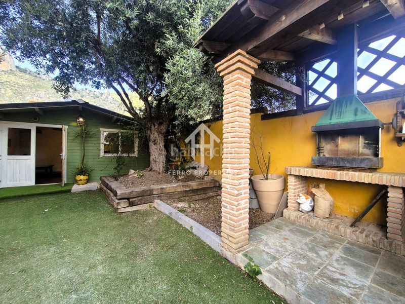 Foto b8c00e65-d0ba-4b9e-b5f2-23096cdbd5d0. Casa aparellada amb calefacció aparcament a Loja