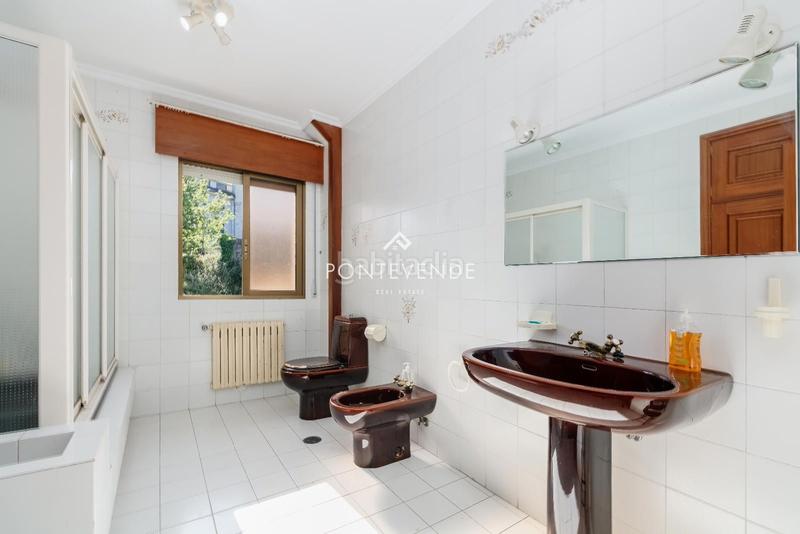 Foto bc190209-abc3-4b04-a534-7c61bea66680. Maison avec parking dans Poio