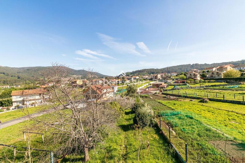 Foto c31dd619-d068-45b9-a295-763a67d89a64. Maison avec parking dans Poio