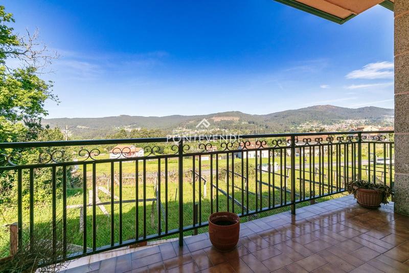 Foto eaba1e99-3d38-43ad-8831-7a5bcb1641b1. Maison avec parking dans Poio