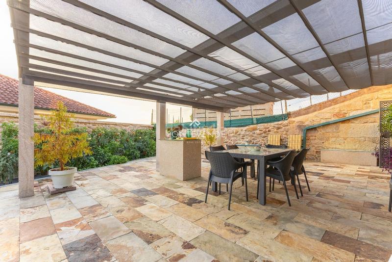 Foto 185a1602-b97c-411a-a468-691adc0bd2d8. Casa con riscaldamento in Aldán Cangas