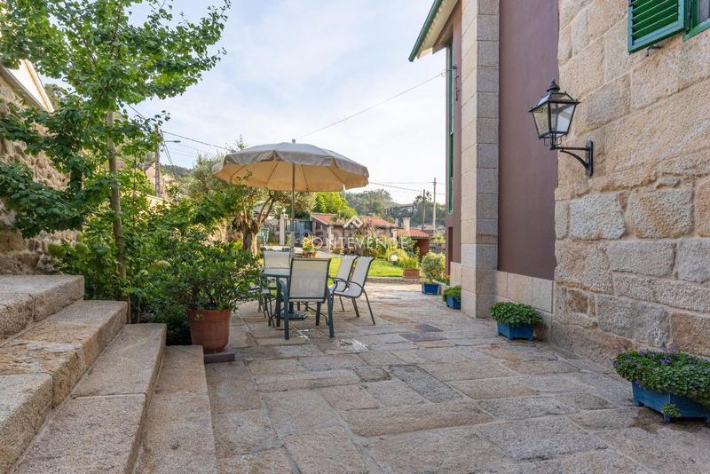 Foto 1b7a0fd9-f64c-4a11-9b41-dbb959ef12cc. Casa con riscaldamento in Aldán Cangas