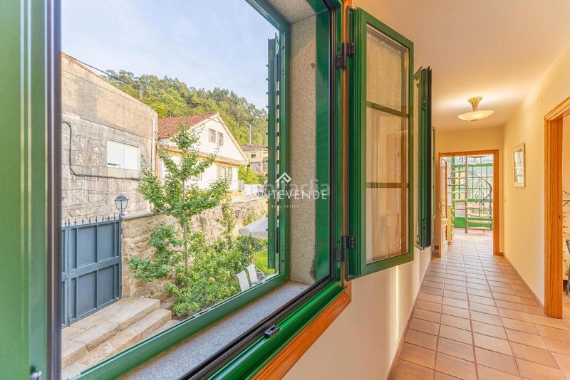 Foto dc955d43-2333-4753-aa62-64efa1faba07. Casa con riscaldamento in Aldán Cangas