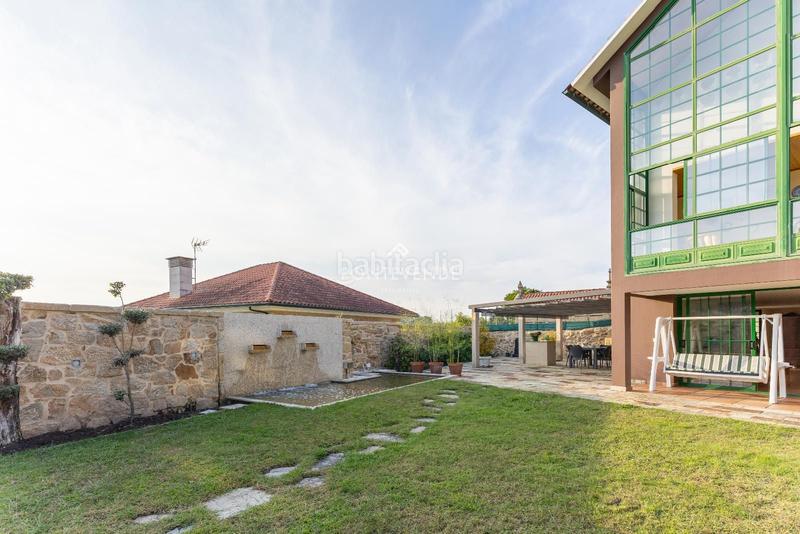 Foto eae5b1b7-e2a2-4b1e-ab3a-d719ea574803. Casa con riscaldamento in Aldán Cangas