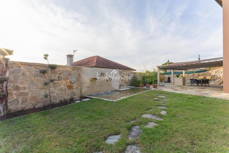 Foto fef8ed4f-e915-492c-9589-10f8a95594c4. Casa con riscaldamento in Aldán Cangas