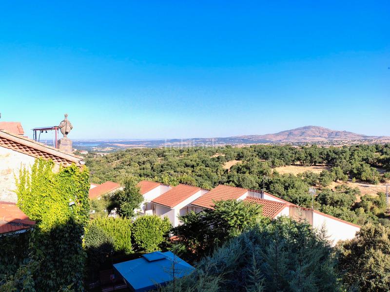 Foto 3038db2b-91b4-4373-90c9-3456915a4491. Chalet with fireplace heating parking in Miraflores de la Sierra