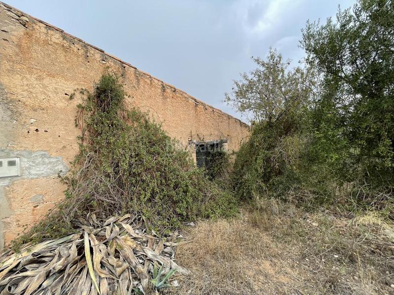 Foto da274b6e-4ebd-4c73-afc5-c715fb68ef56. Masia a Perelló (El)